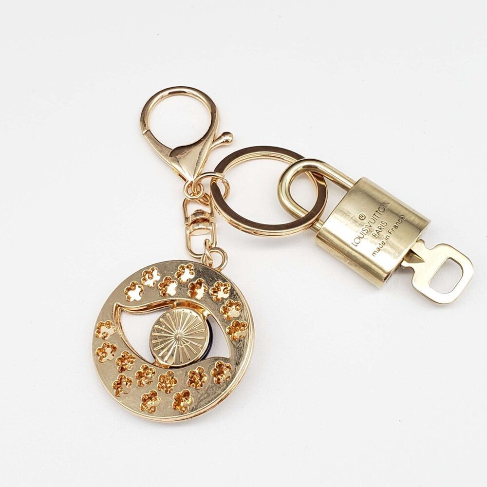 Louis Vuitton Gold Lock 🔒 Authentic LV Key + Unbranded Evil Eye Bag Charm - Picture 3 of 7